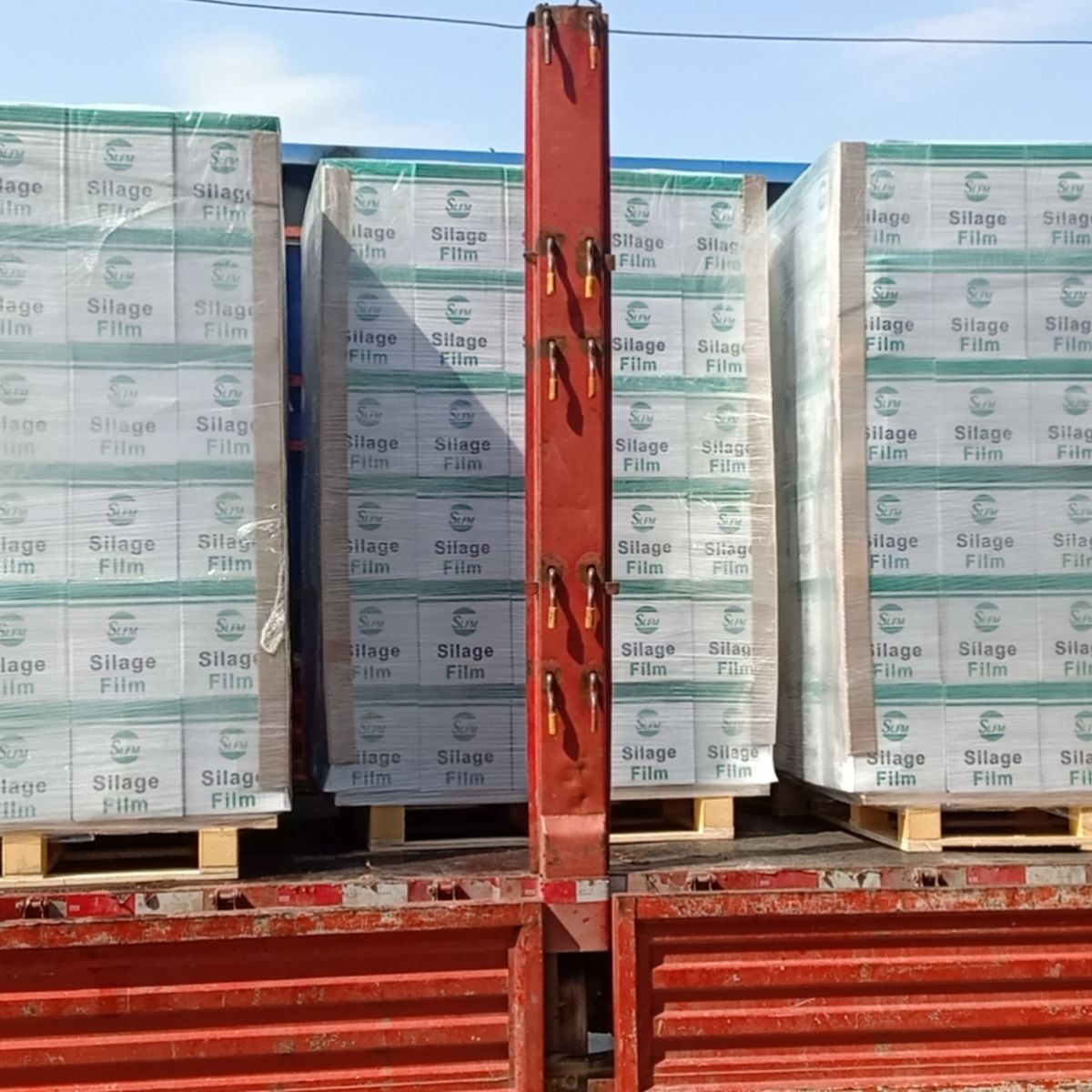 Boxes of Silopak silage film palletised and loaded onto a truck for shipment